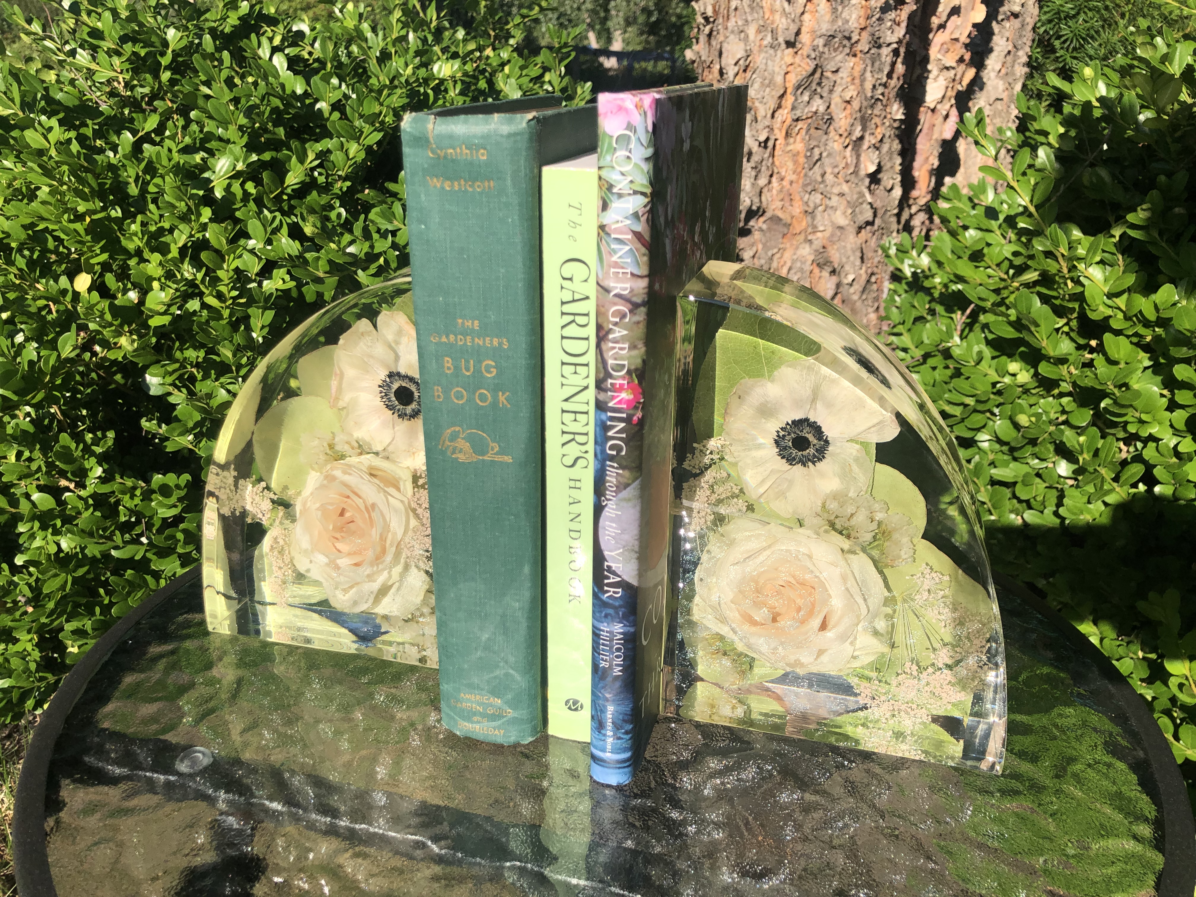 white rose and anemone in resin bookends